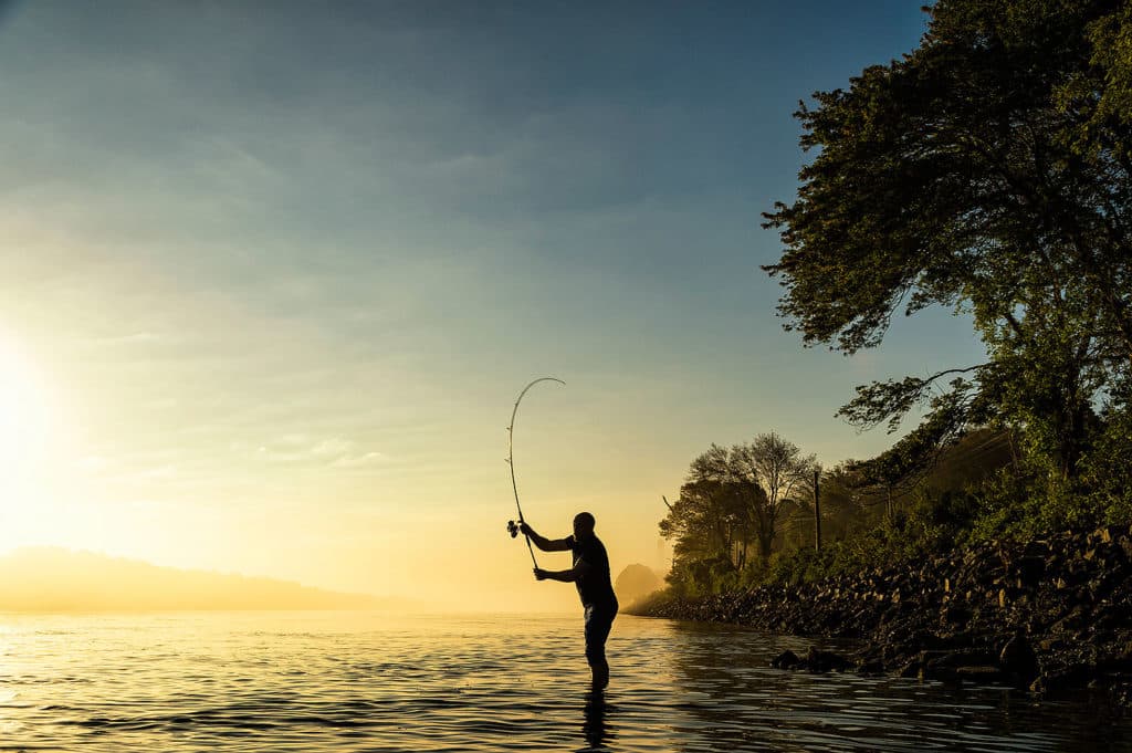 Latitude Run® Fisherman Fly Fishing At Sunrise Photo Photograph