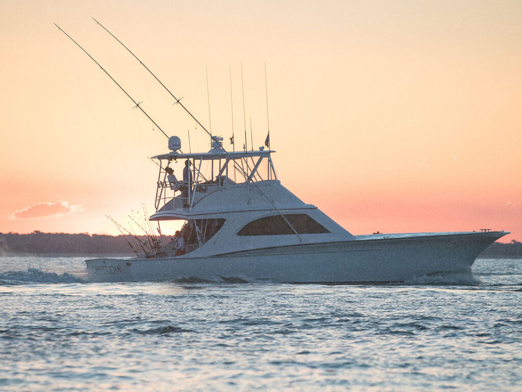 Large sportfishing boat headed out