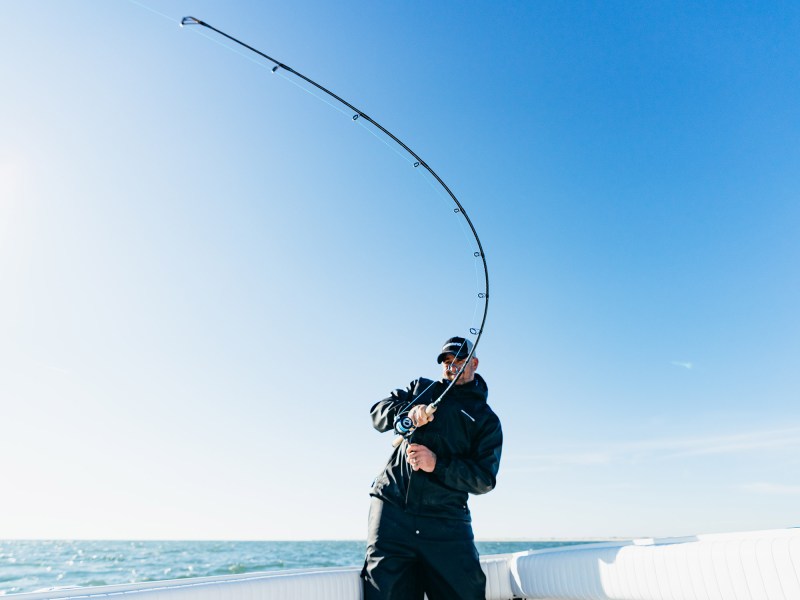 Fighting a striped bass on a spinning rod
